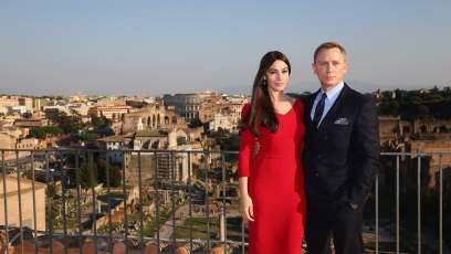 Daniel Craig and Monica Bellucci pose for photos in Rome, Italy ahead of big ‘Spectre’ action sequence