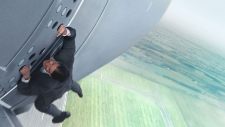 Tom Cruise hangs from a plane in crazy ‘Mission: Impossible Rogue Nation’ clip (video)