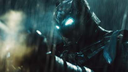Superman throws Batman through the Batsignal in epic new clip