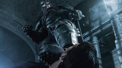 A beaten Batman has his foot at Superman’s throat in epic new image