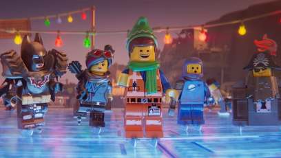 Batman Hits the Eggnog Hard at Emmet’s Holiday Party in New ‘The LEGO Movie 2’ Short